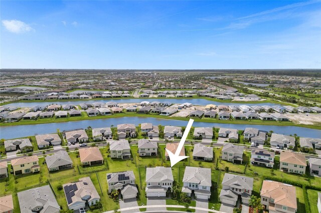 5609 Zestar Ln, Loxahatchee, FL 33470 - aerial view of residential area featuring a large body of water