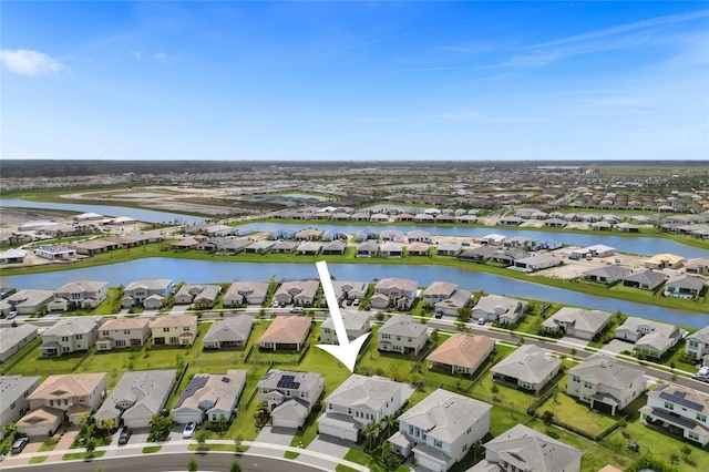 5609 Zestar Ln, Loxahatchee, FL 33470 - aerial perspective of suburban area featuring a large body of water
