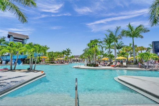 5609 Zestar Ln, Loxahatchee, FL 33470 - community pool featuring a patio