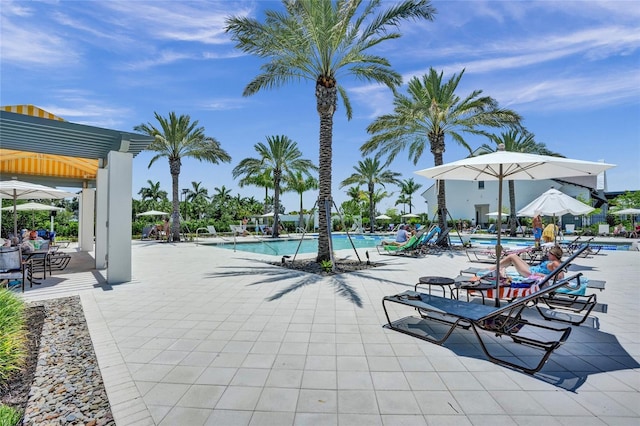 5609 Zestar Ln, Loxahatchee, FL 33470 - community pool featuring a patio area