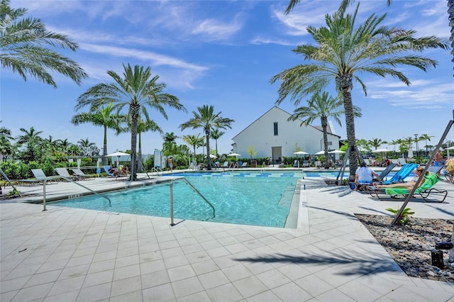 5609 Zestar Ln, Loxahatchee, FL 33470 - community pool with a patio area