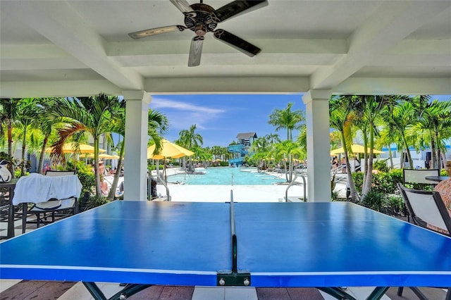 5609 Zestar Ln, Loxahatchee, FL 33470 - view of patio with ceiling fan, a community pool, and outdoor dining area