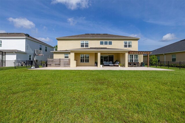 1113 Fieldstone Cir, Oviedo, FL 32765 - back of house featuring a patio area, a pergola, stucco siding, and an outdoor living space