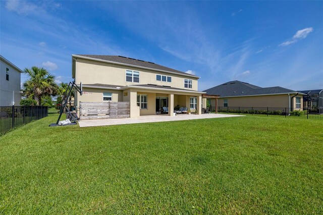 1113 Fieldstone Cir, Oviedo, FL 32765 - rear view of property featuring stucco siding, a patio, and a fenced backyard