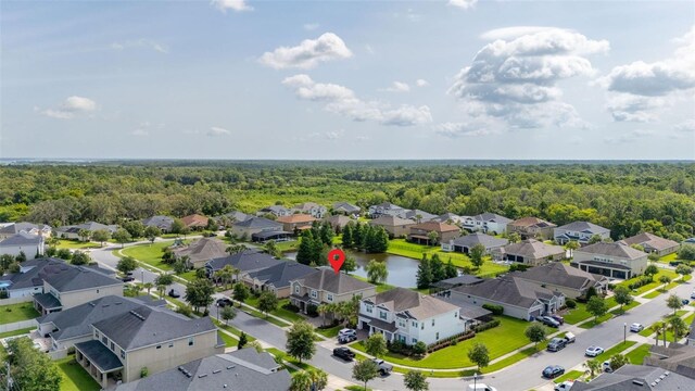 1113 Fieldstone Cir, Oviedo, FL 32765 - aerial perspective of suburban area featuring a forest