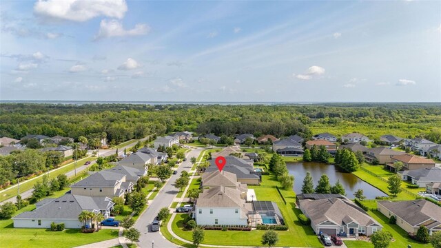 1113 Fieldstone Cir, Oviedo, FL 32765 - aerial perspective of suburban area featuring a nearby body of water and a forest
