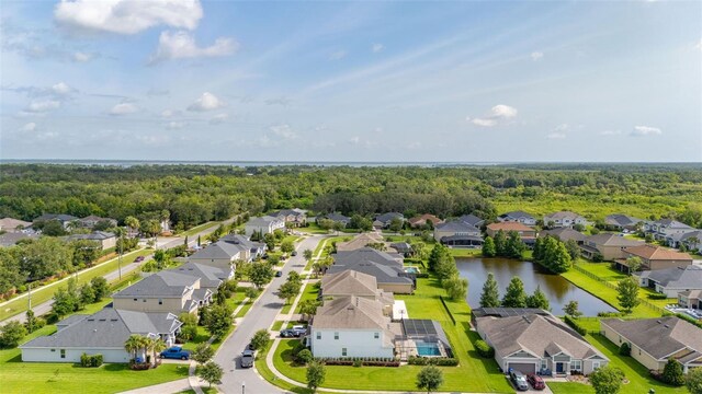 1113 Fieldstone Cir, Oviedo, FL 32765 - aerial perspective of suburban area featuring a large body of water and a heavily wooded area