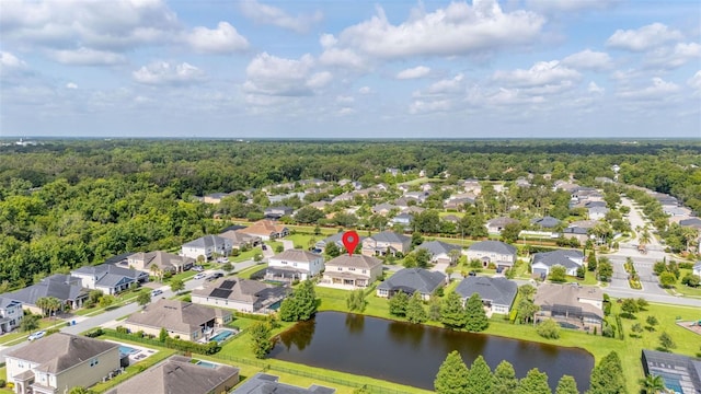 1113 Fieldstone Cir, Oviedo, FL 32765 - aerial perspective of suburban area with a nearby body of water and a heavily wooded area