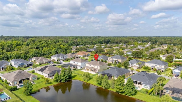 1113 Fieldstone Cir, Oviedo, FL 32765 - aerial view of residential area featuring a large body of water and a heavily wooded area