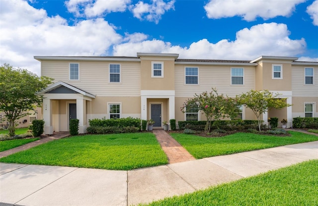 110 Claire Ln, Davenport, FL 33837 - view of property featuring stucco siding and a front yard