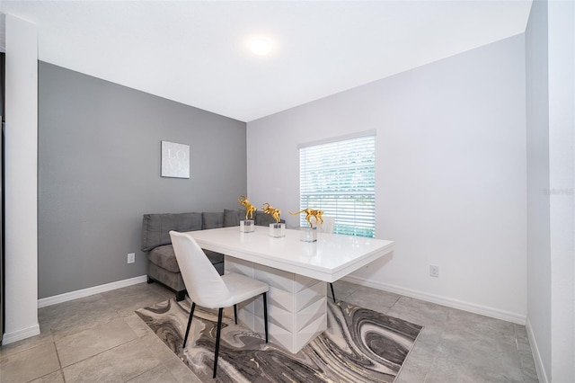 110 Claire Ln, Davenport, FL 33837 - dining room with baseboards and an office area