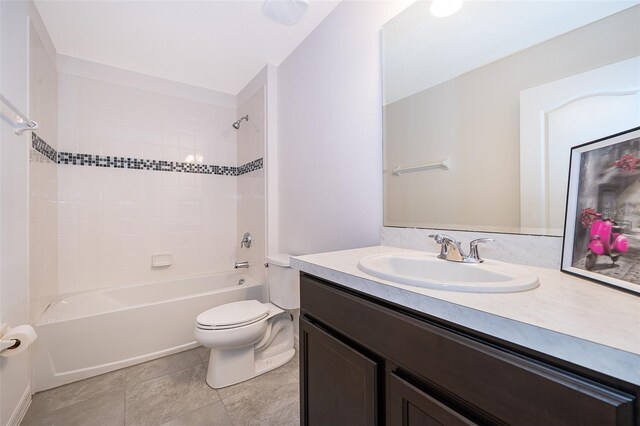 110 Claire Ln, Davenport, FL 33837 - bathroom featuring vanity, toilet, shower / tub combination, and tile patterned floors