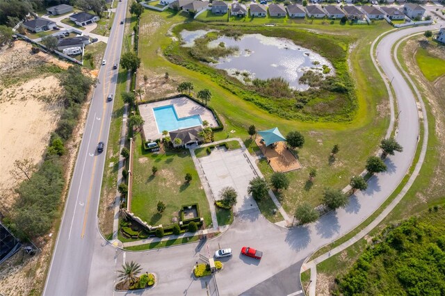 110 Claire Ln, Davenport, FL 33837 - aerial view of property's location with nearby suburban area, a pool, and a nearby body of water
