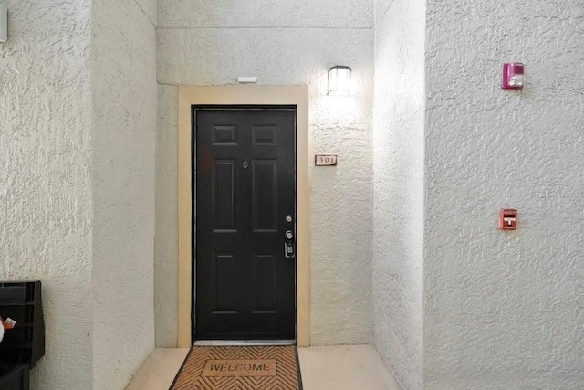 1321 Arbor Vista Loop Unit 301, Lake Mary, FL 32746 - view of exterior entry featuring stucco siding