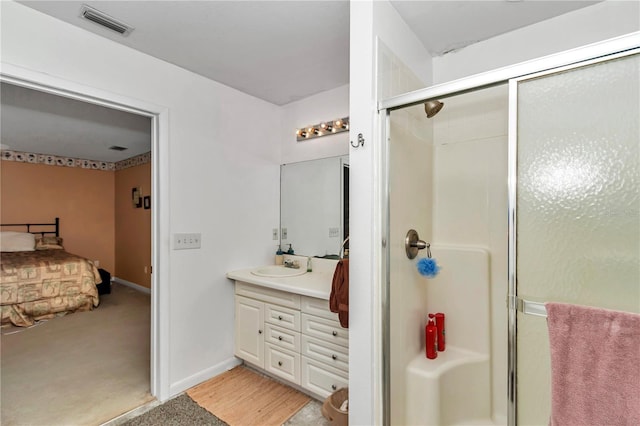 40533 E 8th Ave, Umatilla, FL 32784 - ensuite bathroom with vanity and a stall shower