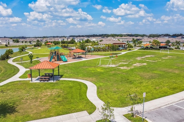 129 Eagleview Loop, Davenport, FL 33837 - aerial perspective of suburban area with a community park