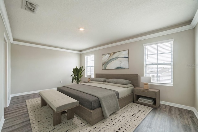 129 Eagleview Loop, Davenport, FL 33837 - bedroom featuring ornamental molding and wood finished floors