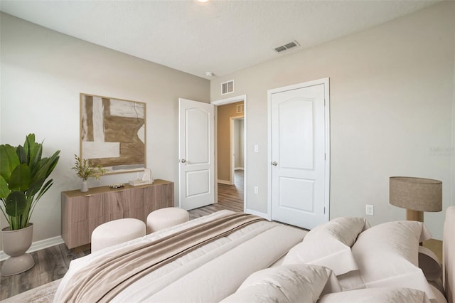 129 Eagleview Loop, Davenport, FL 33837 - bedroom featuring baseboards and wood finished floors