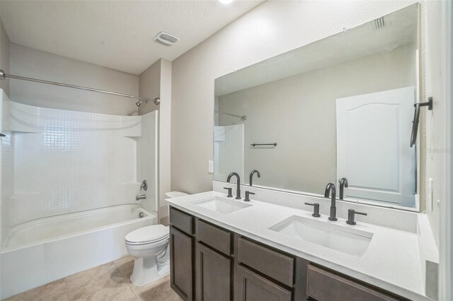 129 Eagleview Loop, Davenport, FL 33837 - bathroom with tub / shower combination, double vanity, and tile patterned flooring