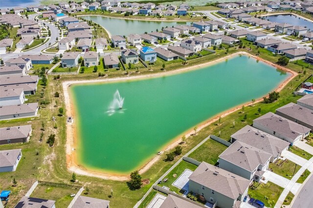 129 Eagleview Loop, Davenport, FL 33837 - aerial view of property's location with nearby suburban area and a large body of water