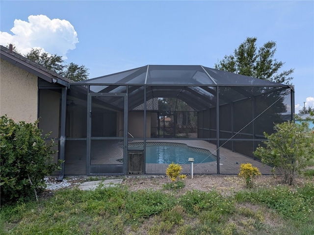 141 Angol St, Punta Gorda, FL 33983 - swimming pool with a patio area and glass enclosure