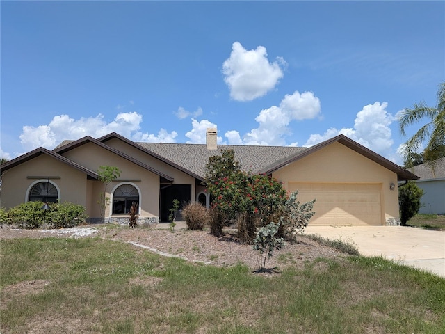 141 Angol St, Punta Gorda, FL 33983 - single story home featuring stucco siding, a chimney, a garage, concrete driveway, and a front yard
