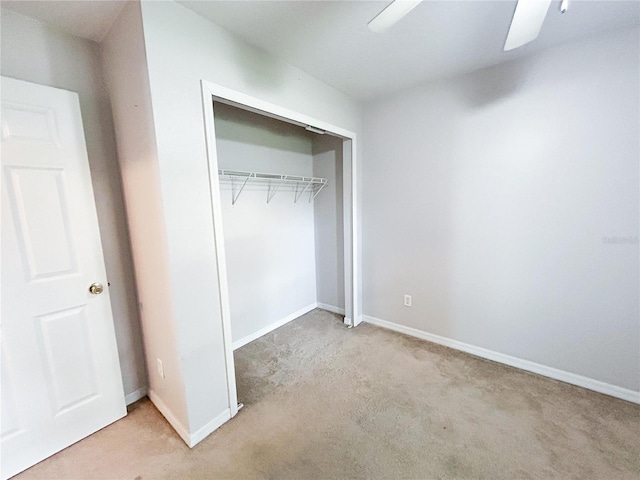 312 W Hull Ave, Oakland, FL 34760 - unfurnished bedroom with light carpet, a closet, and baseboards