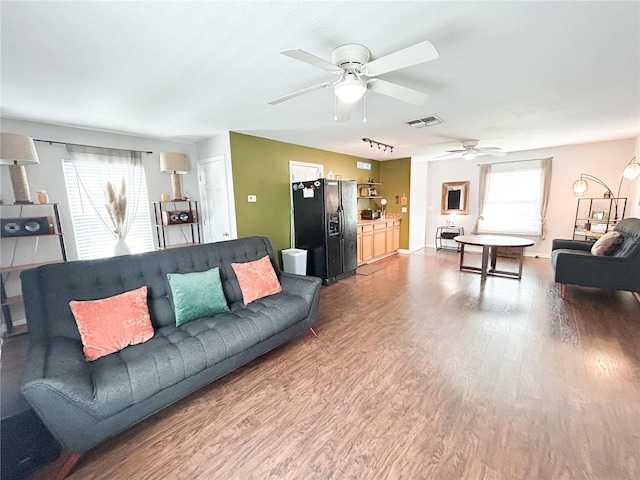 312 W Hull Ave, Oakland, FL 34760 - living room with ceiling fan and wood finished floors