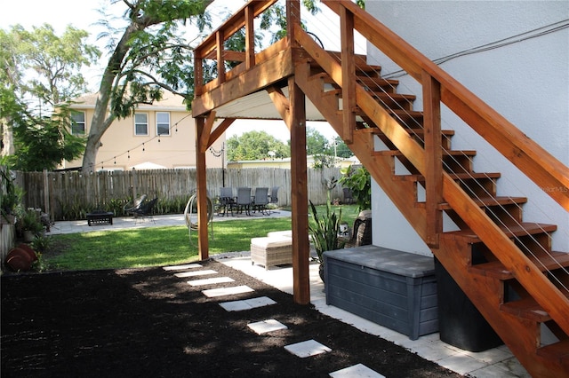 312 W Hull Ave, Oakland, FL 34760 - view of yard with a patio, an outdoor fire pit, stairs, and outdoor dining area