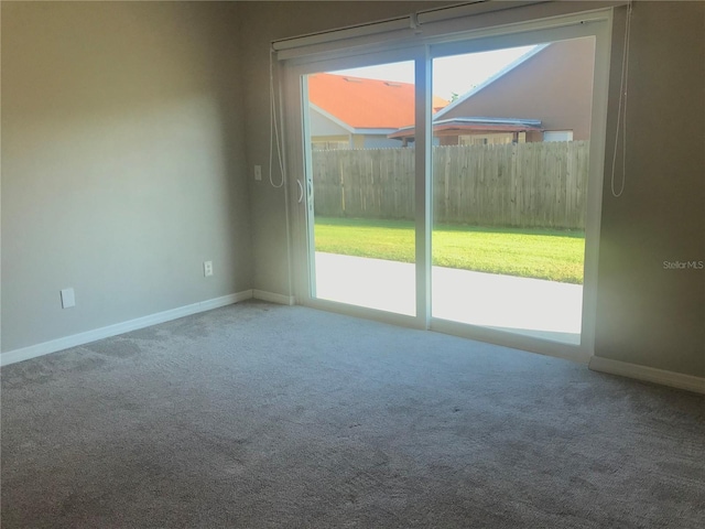 10969 Norcross Cir, Orlando, FL 32825 - unfurnished room with carpet flooring and baseboards