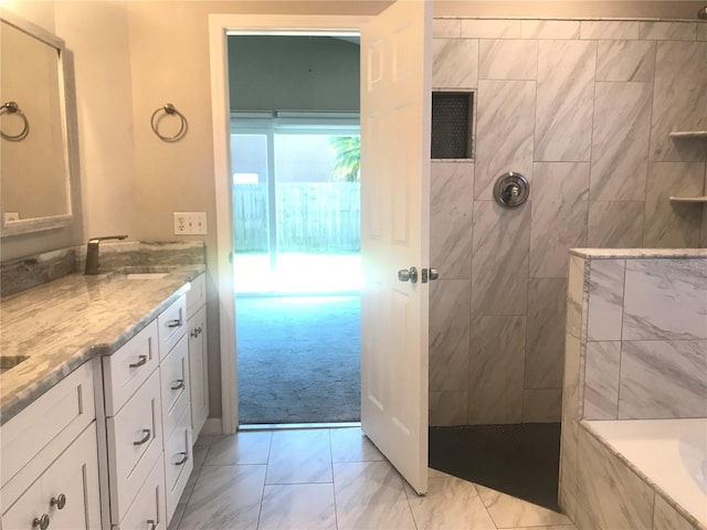 10969 Norcross Cir, Orlando, FL 32825 - bathroom with double vanity, walk in shower, and marble finish flooring