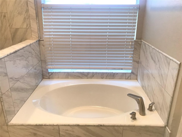 10969 Norcross Cir, Orlando, FL 32825 - full bathroom with a garden tub