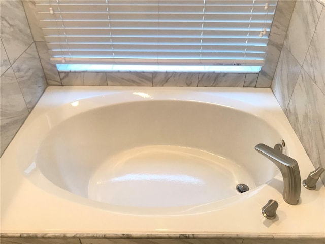 10969 Norcross Cir, Orlando, FL 32825 - bathroom view of a bathtub