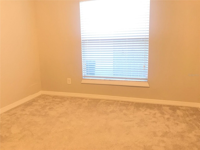 10969 Norcross Cir, Orlando, FL 32825 - unfurnished room with carpet flooring and baseboards