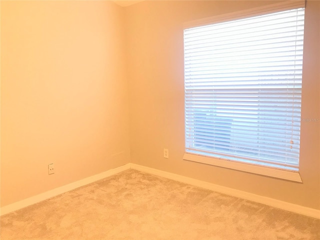 10969 Norcross Cir, Orlando, FL 32825 - empty room with carpet and baseboards