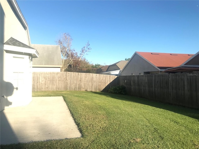 10969 Norcross Cir, Orlando, FL 32825 - view of yard with a patio area