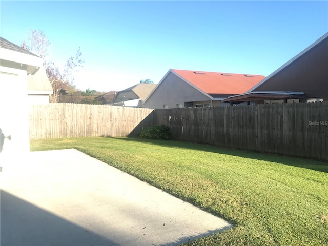 10969 Norcross Cir, Orlando, FL 32825 - view of yard with a patio area
