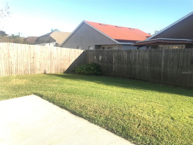 10969 Norcross Cir, Orlando, FL 32825 - view of yard with a patio