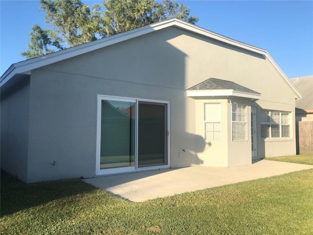 10969 Norcross Cir, Orlando, FL 32825 - back of house with a patio area and stucco siding