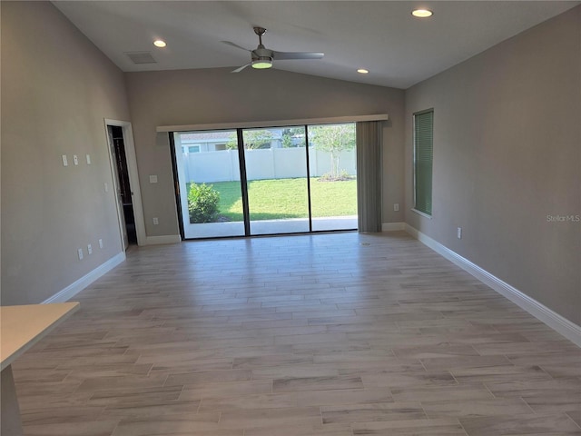 12513 Oak Hill Way, Parrish, FL 34219 - spare room with lofted ceiling, ceiling fan, light wood-style floors, recessed lighting, and baseboards