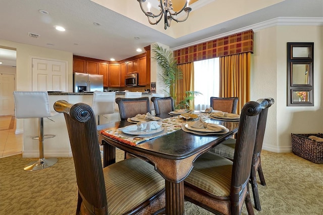 7616 Cabana Ct Unit 301, Reunion, FL 34747 - dining room with light carpet, a chandelier, recessed lighting, and crown molding