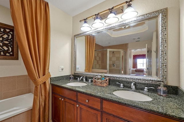 7616 Cabana Ct Unit 301, Reunion, FL 34747 - bathroom featuring a shower stall, a bath, and double vanity