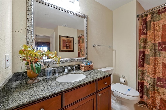 7616 Cabana Ct Unit 301, Reunion, FL 34747 - bathroom featuring vanity and a textured wall