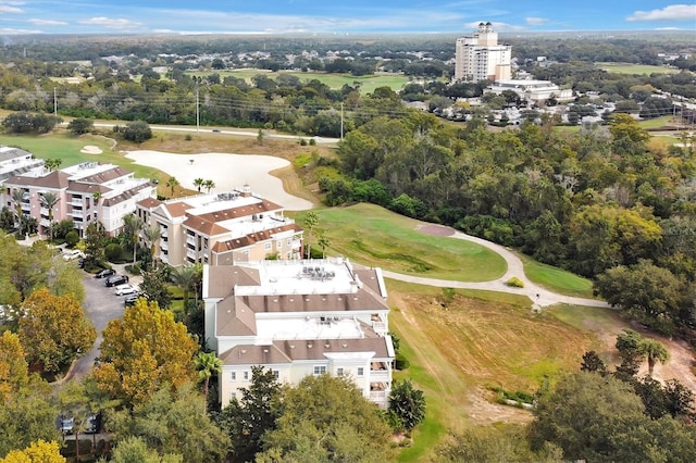 7616 Cabana Ct Unit 301, Reunion, FL 34747 - bird's eye view of a golf course and apartment complex
