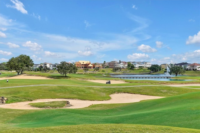 7616 Cabana Ct Unit 301, Reunion, FL 34747 - surrounding community featuring golf course view, a water view, a residential view, and a lawn