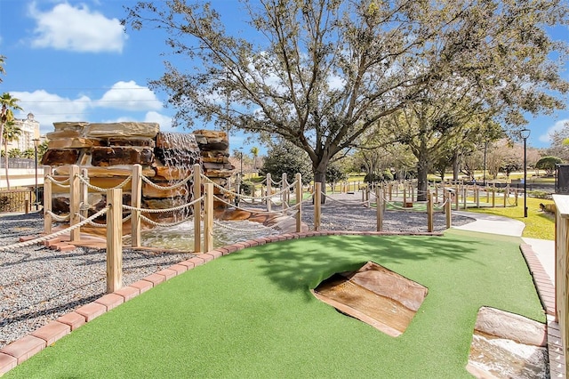 7616 Cabana Ct Unit 301, Reunion, FL 34747 - view of yard featuring a putting green