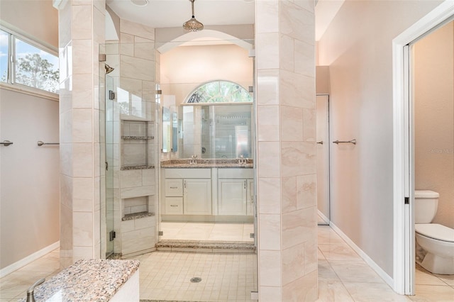 924 Texas St, Englewood, FL 34223 - full bath featuring a stall shower, toilet, vanity, and baseboards