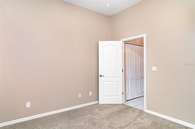 924 Texas St, Englewood, FL 34223 - unfurnished room featuring light carpet, baseboards, and ceiling fan