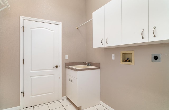 924 Texas St, Englewood, FL 34223 - laundry area featuring electric dryer hookup, washer hookup, cabinet space, and baseboards