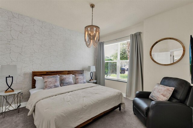 17441 Hidden Forest Dr, Clermont, FL 34714 - carpeted bedroom featuring a chandelier